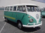 VW 13-window deluxe bus with custom graphics on the sides