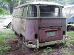 VW 23 Window Deluxe Bus Sitting in Old Volkswagen Storage Yard