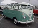 Restored VW 23-window deluxe samba bus with stock L380 turquoise paint on lower half