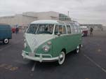 Vintage Volkswagen 23-window deluxe samba bus with wide white wall tires
