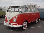 Vintage Volkswagen 23-window bus samba deluxe with wide white walls