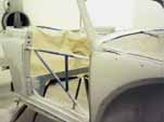 Continue spraying the prime coats on the 1954 VW convertible