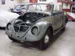 Front shot of the restored 1954 Volkswagen convertible body mounted on the chassis