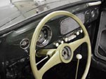 Rare batwing steering wheeel in 1954 Volkswagen convertible bug has been restored and painted