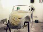 Begin priming the body as part of the 1954 VW convertible restoration