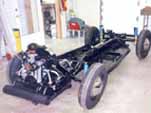 Fully restored 1954 Volkswagen convertible chassis is ready for the restored body to be mounted