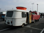 VW Double Cab Pickup towing a vintage Eriba Puck travel trailer