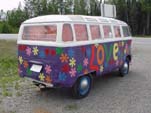 Hippy love paint job on old VW 23-window deluxe bus