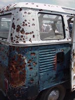 Area 51 Volkswagen 21-window samba bus full of bullet holes