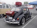 Vintage VW bug painted flawless black and with vintage accessories