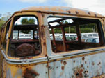 Wrecking yard with Classic 23-Window Samba bus - lots of holes!